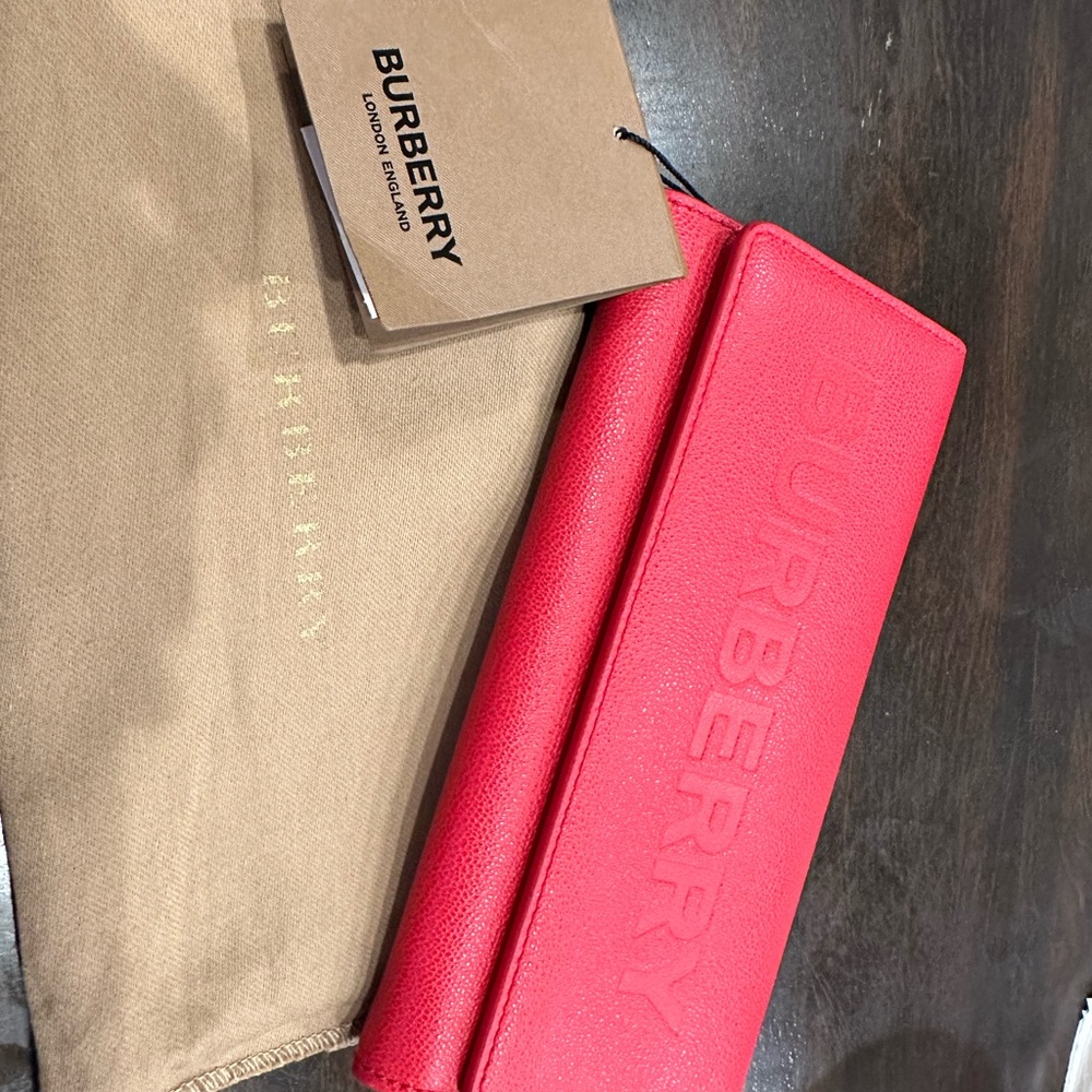 NWT red Burberry snap wallet.